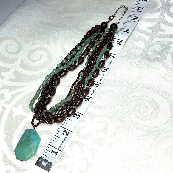 Multi-strand faux turquoise pendant adjustable necklace of browns and blue green - Picture 4 of 6